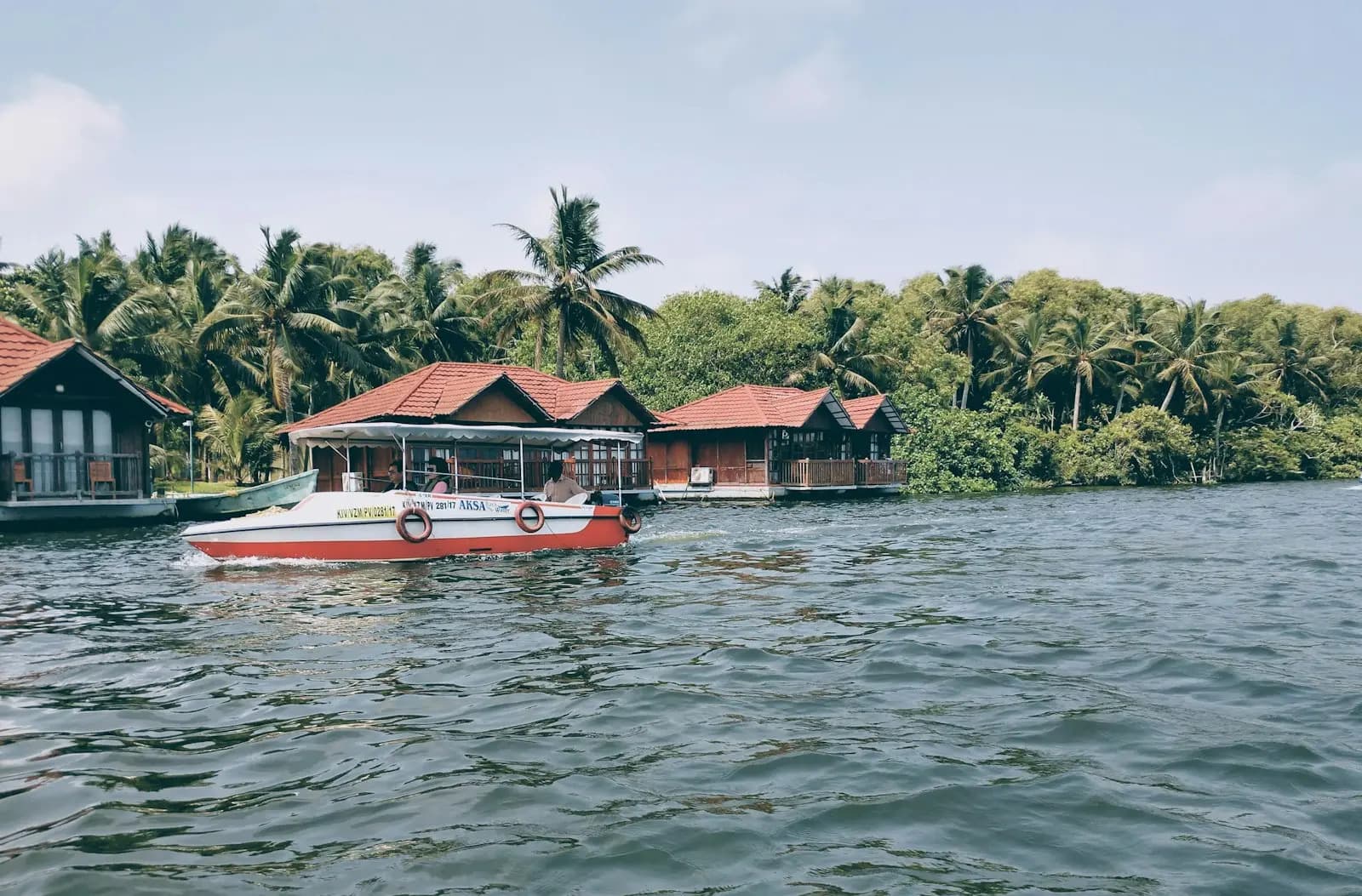 Floating cottages on the Poovar backwater — the kind of stay you experience near the estuary