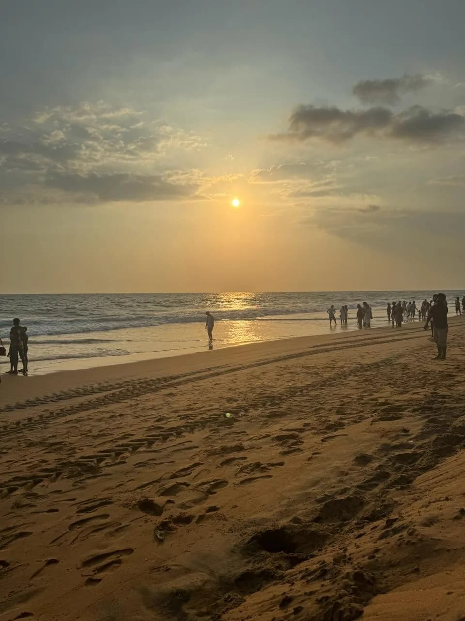 Shangumugham Beach evening view with shoreline, sunset atmosphere, and seaside scenery in Trivandrum