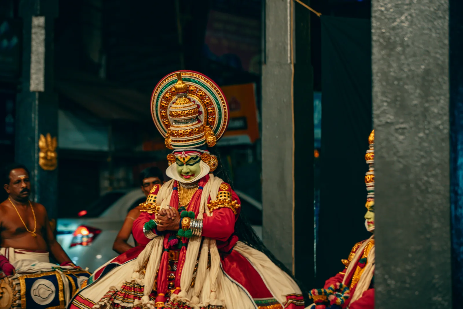 Kathakali performance in the evening at Kovalam showcasing Kerala's traditional dance-drama, costumes, and cultural heritage