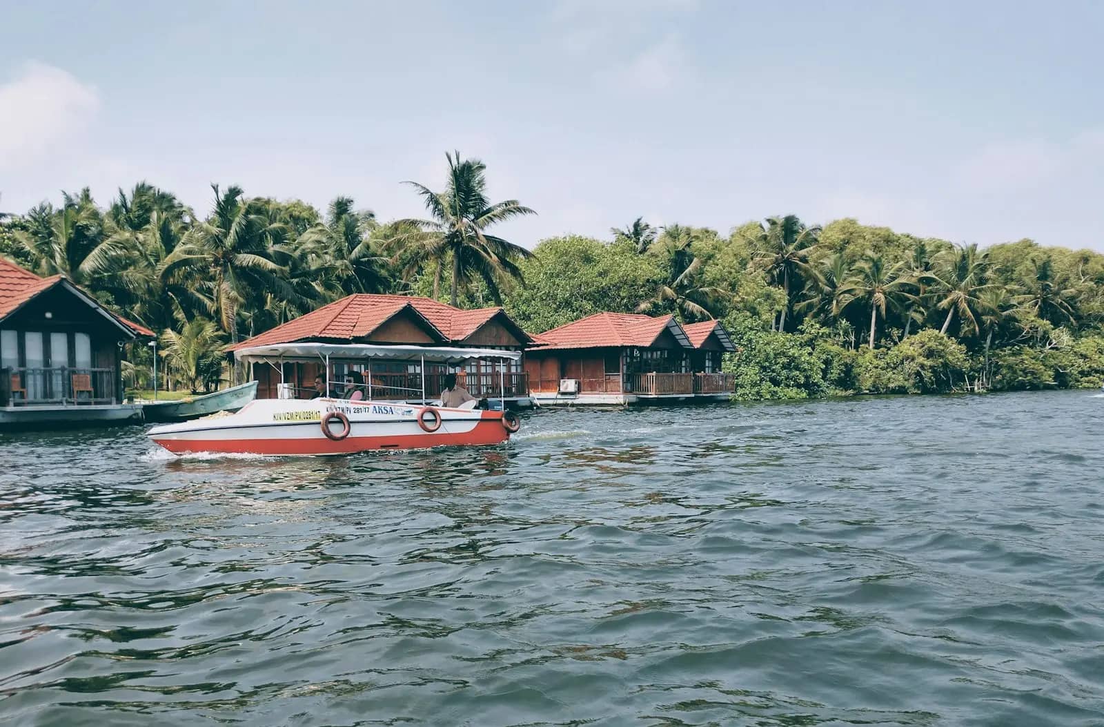 Floating cottages on the Poovar backwater — the kind of stay you experience near the estuary