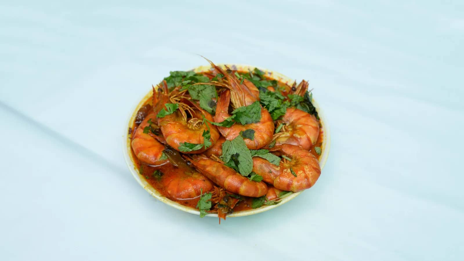 Fresh Kerala seafood experience in Kovalam featuring locally prepared fish dishes and coastal cuisine the way locals enjoy it